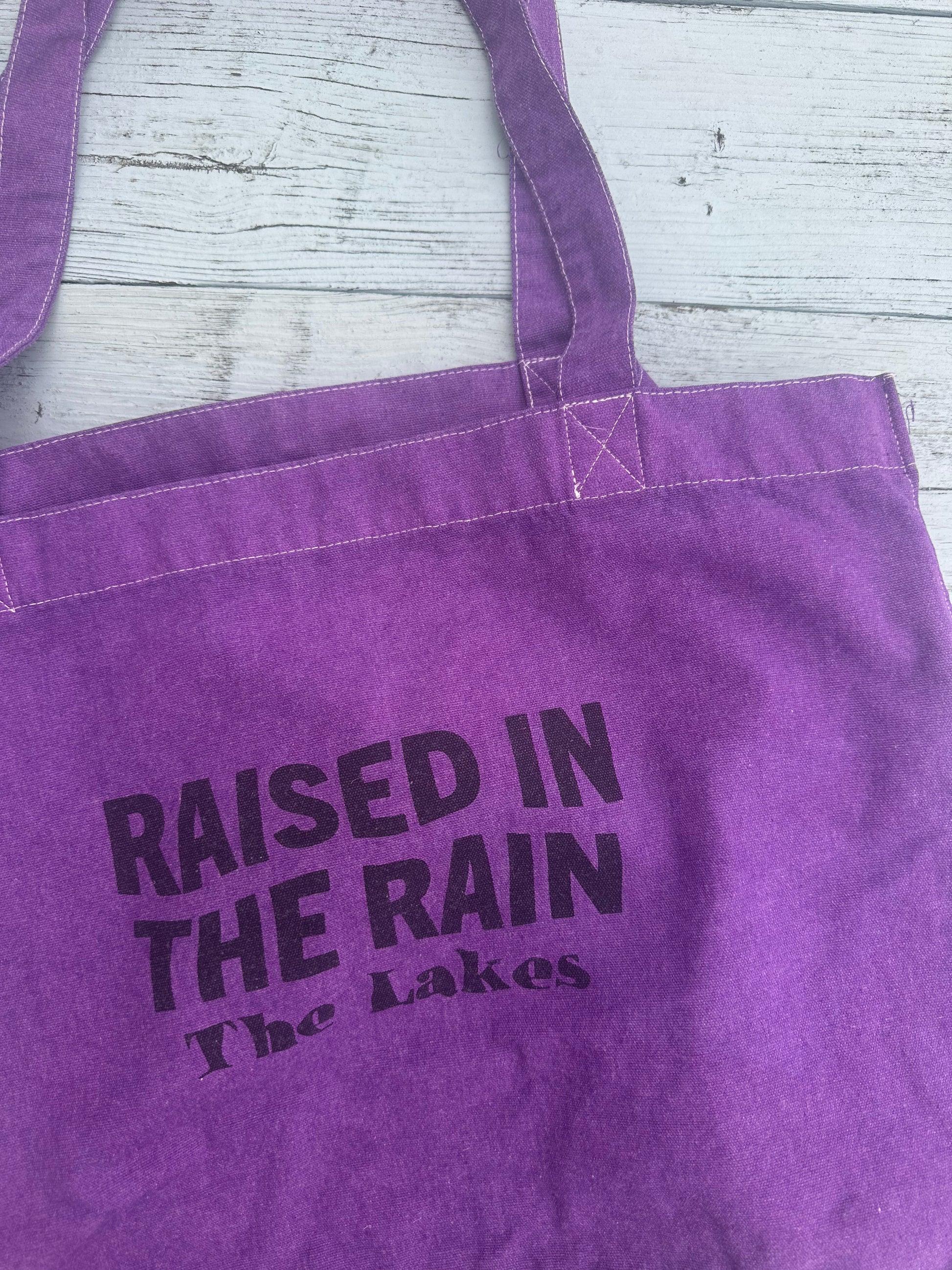 it's in the bag the rain Raised In The Rain Tote Bag